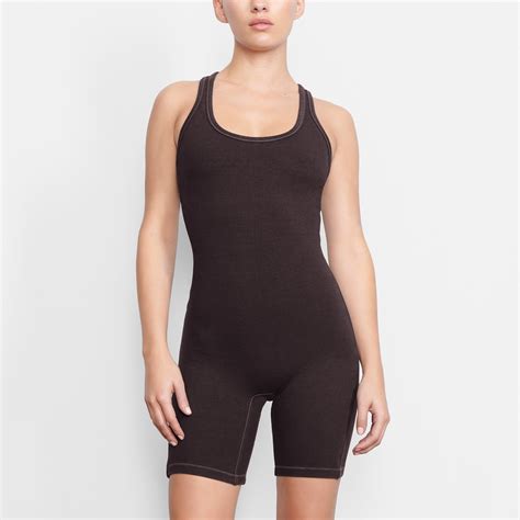 skims mid thigh bodysuit.